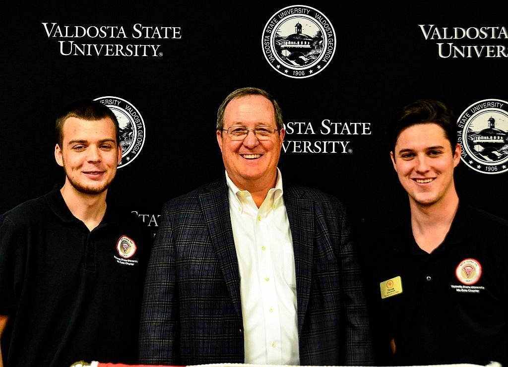 john mcduffie with scholarship recipients